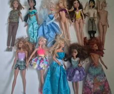 Lot of 12 Barbie dolls