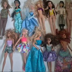Lot of 12 Barbie dolls