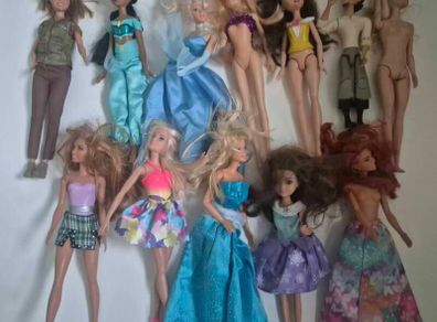 Lot of 12 Barbie dolls
