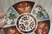 Imari rickshaw and phoenix plate