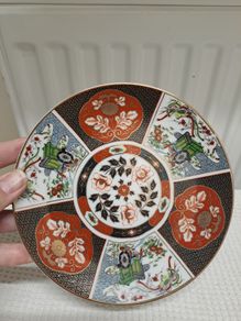 Imari rickshaw and phoenix plate