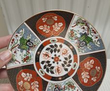 Imari rickshaw and phoenix plate