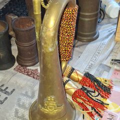 Antique Brass Military Bugle features a Distinctive Cap Badge