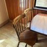Wooden dining table and six chairs Image 3