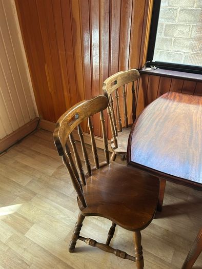 Wooden dining table and six chairs
