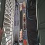 skis,boots,poll,travel bag Image 5