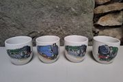 4 Vintage egg cups trains