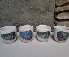 4 Vintage egg cups trains