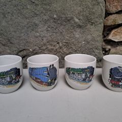 4 Vintage egg cups trains