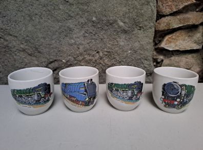 4 Vintage egg cups trains