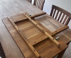 Solid oak dining table and chairs