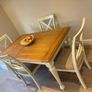 Extendible Wooden dining table & 4 fabric cushioned chairs Image 3