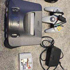 Nintendo 64 Black + Controller + F1 Grand Prix + Few accesories
