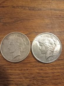 Coins ..peace dollars x2