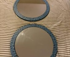 Two round mirrors with water drop pattern frames