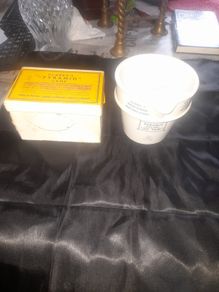 Clarkes Pyramid lamp night light and an Advertisment Box, comprising a white glazed ceramic reservoir marked Prices Patent Candle Company Limited, London