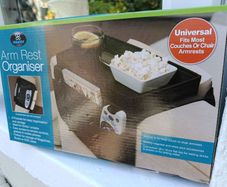 TV arm rest organiser