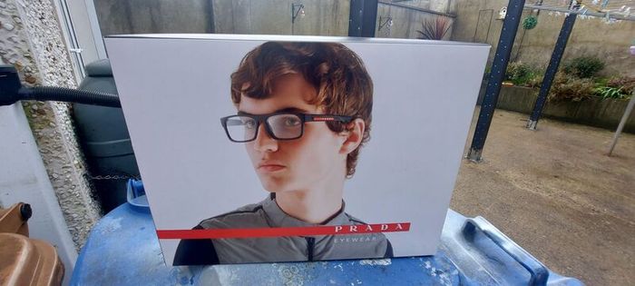 2 x glasses advertising double sided showcards displays items,,nice condition, well known brands , sold as seen ,