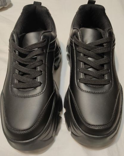 High black trainers.