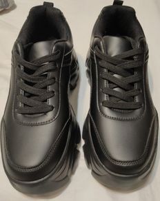 High black trainers.