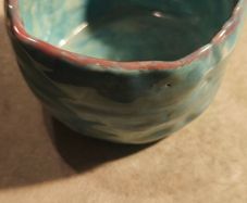 Handmade Pottery ceramic pinch pot or small cup turquoise and purple  .