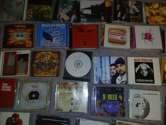 Collection of 58 assorted music CDs