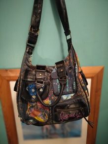 shoulder bag is from the brand Desigual.