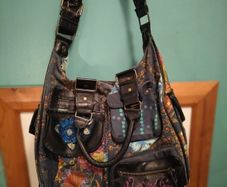shoulder bag is from the brand Desigual.