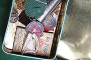 old tin and contents