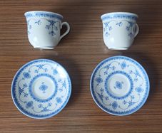 Vintage "Queen's Ingrid" cups with Blue and White floral design with matching saucers  made in England