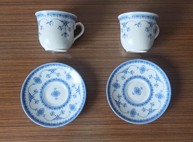 Vintage "Queen's Ingrid" cups with Blue and White floral design with matching saucers  made in England