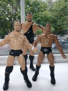 Westlers The Rock, Stone Cold and Big Show