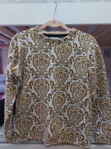 Gold and black design top