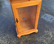 Lovely wooden unit with glass door