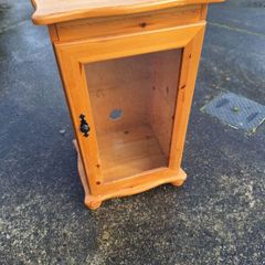 Lovely wooden unit with glass door