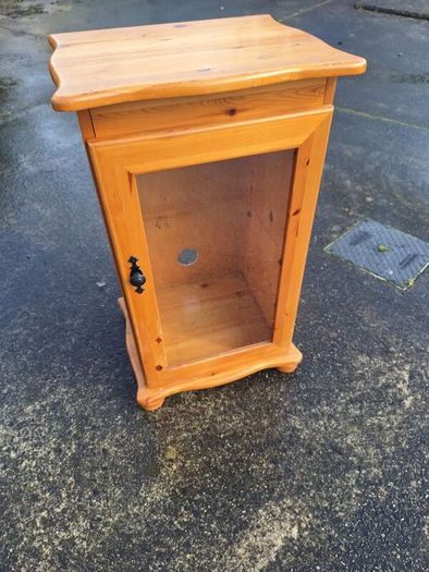 Lovely wooden unit with glass door