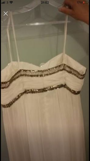 Brand new with tag designer handmade wedding dress by Dresscode. Grecian style with embellishments