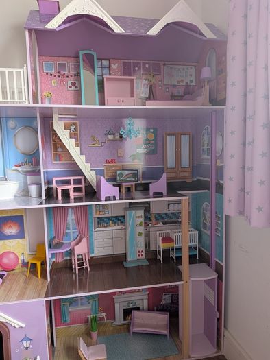 Large wooden dolls house with furniture