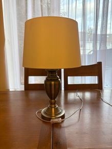 traditional styled modern finish table lamp antique brass