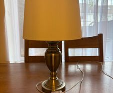 traditional styled modern finish table lamp antique brass