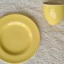 Carrigaline Yellow Pottery Cup and Side Plate Image 2
