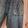 distressed denim jeans Image 2