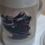 colour change cup. Picture changes from dragon to great wall of china when hot liquid added. Image 2