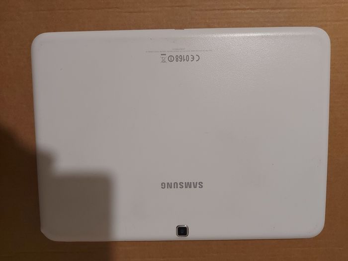 Samsung Galaxy Tab 4, Model SM-T530, 16GB, White, working great, in excellent condition and with a bunch of Family-children  movies