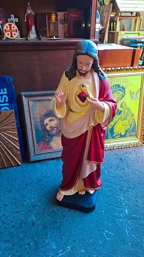 Antique holy statue and pictures