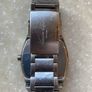 Kenneth Cole designer watch. Water Resistant. A few worn scratches but still working perfectly. Battery easily replaced and sits into the back of it. Image 2