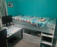Mid sleeper bed with pull out desk and cabinet
