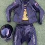 Motor cycle racing leathers with boots, gloves and helmet. Image 2