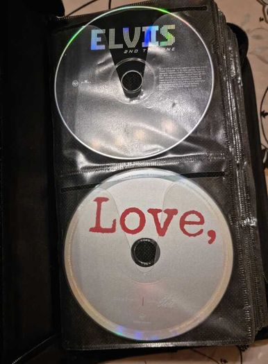 80 CD + Case. All CD's in perfect playable condition.