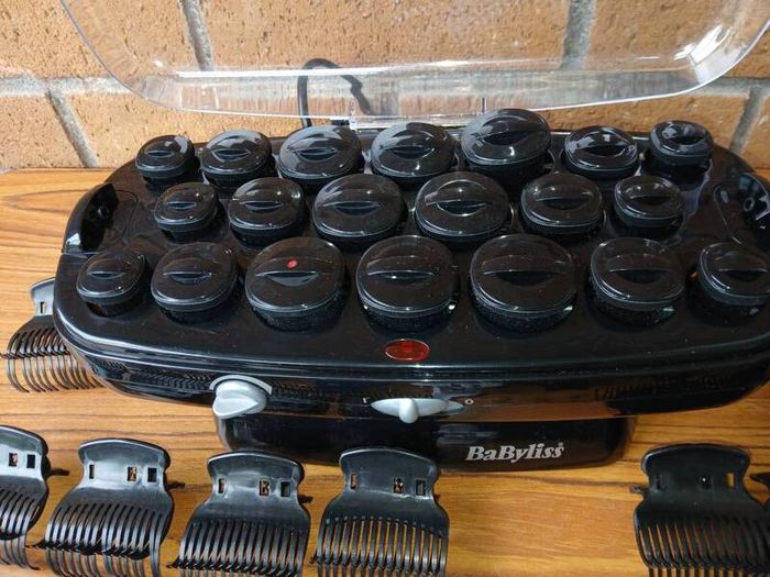 New BaByliss heated hair roller kit including rollers and clips.